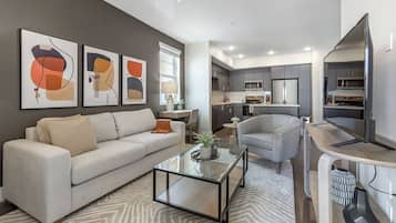 Apartment, 2 Bedrooms | Living area | 50-inch TV with digital channels, ping pong