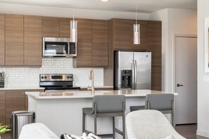 Apartment, 2 Bedrooms | Private kitchen | Full-size fridge, microwave, oven, stovetop - Landing Apartments - Indian Trail (Indian Trail)