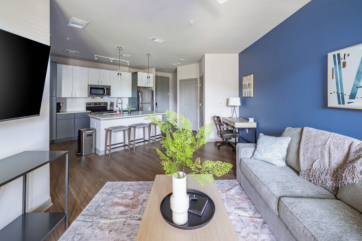 Apartment, 1 Bedroom | Living area | 50-inch Smart TV with digital channels