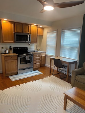 Economy Apartment, Courtyard View | Private kitchen | Fridge, microwave, oven, stovetop