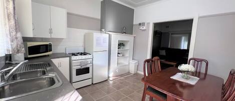 Fridge, microwave, oven, cookware/dishes/utensils