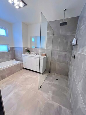 Shower, hair dryer, towels, soap