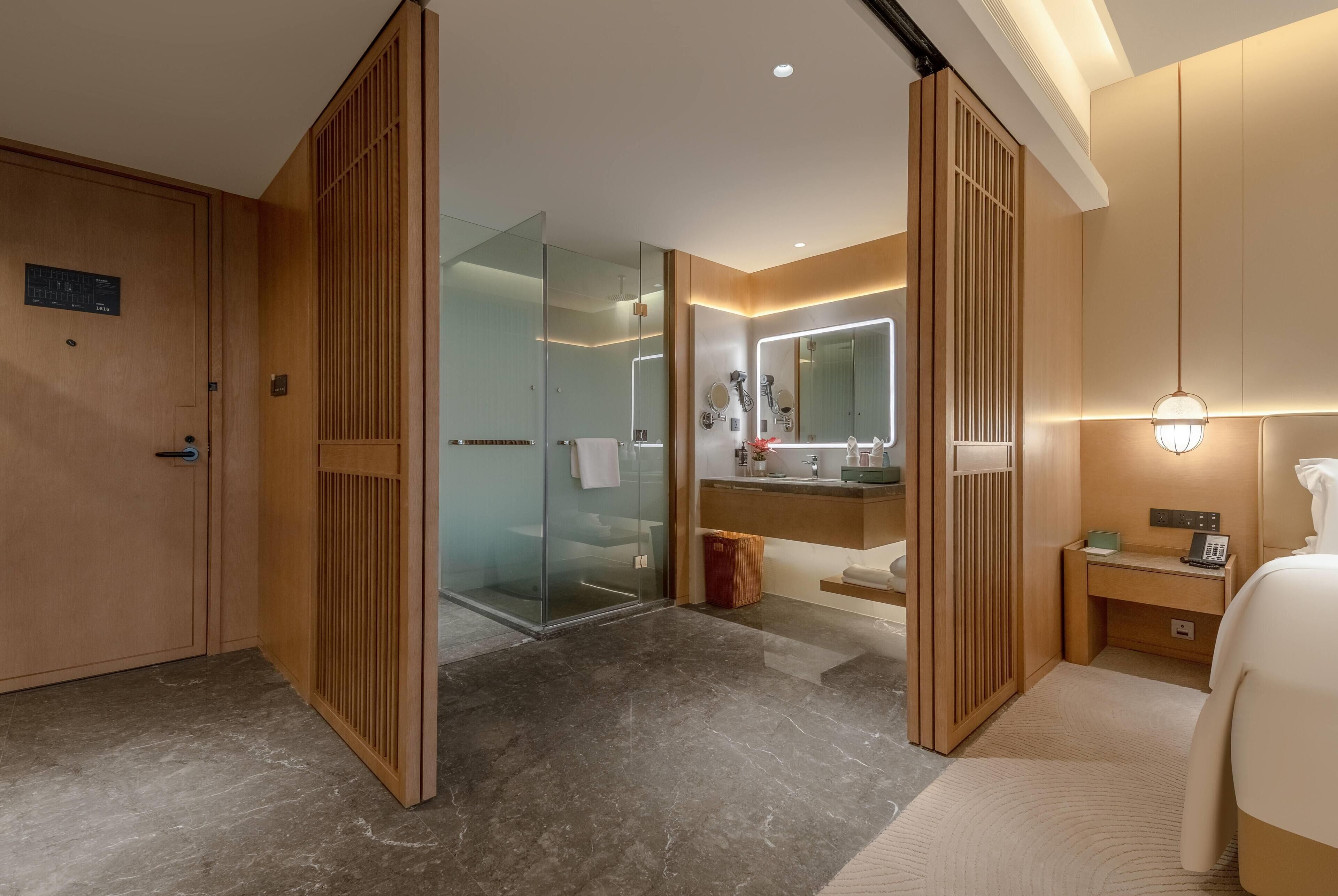 Habitación Deluxe, 2 camas individuales, para no fumadores | Baño | Secadora de cabello y pantuflas 