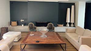 A modern living room with a fireplace, two armchairs, a sofa, and a coffee table. - ARCHITECT HOUSE SOUTH FACING 2 min FROM THE LANSERIA BEACH QUIMIAC MESQUER (Mesquer)