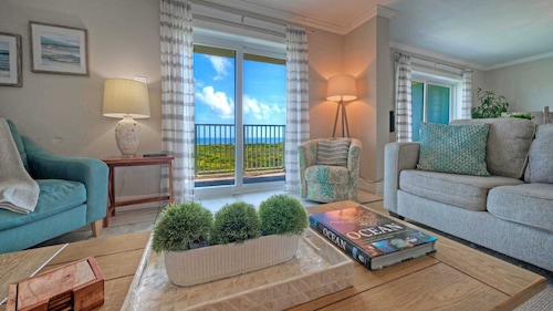 Gulf Views + Pools, Tennis, Pickleball & Beach Access Awesome Beachfront by Avantstay