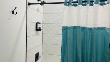 Hair dryer, towels, soap, shampoo