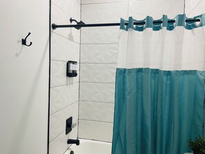 Hair dryer, towels, soap, shampoo