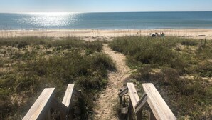 A beach path leading to the shore with a clear view of the ocean. - Classic Beachfront Home on Gulf of Mexico at TWIN PEAKS now with Elevator (Saint George Island)