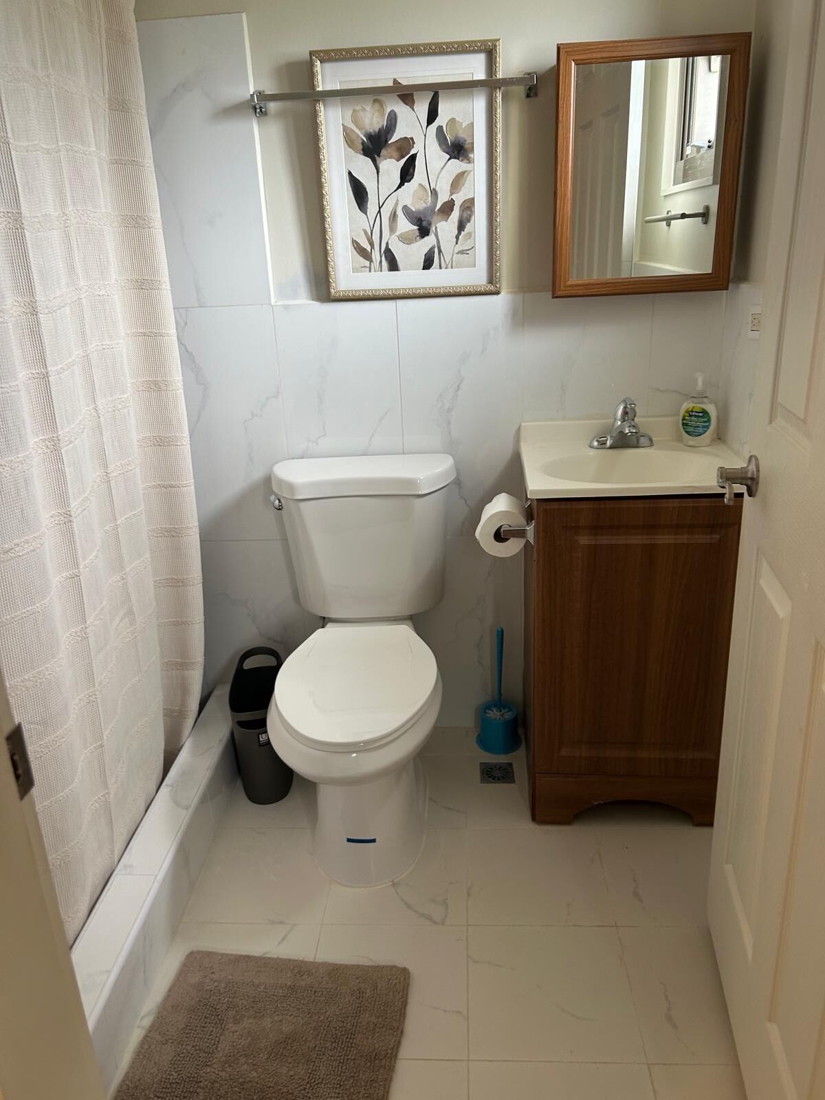 Shower, towels, soap, toilet paper