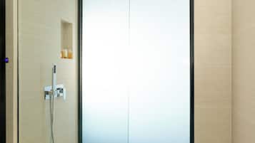 Deluxe Single Room | Bathroom | Shower, hair dryer, towels, soap