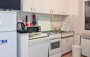 Refrigerador, horno, placa de cocina, lavavajillas