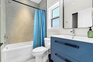 Hair dryer, towels, soap, toilet paper