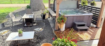 Farm style home in the heart of wine country, with acreage and a hot tub!