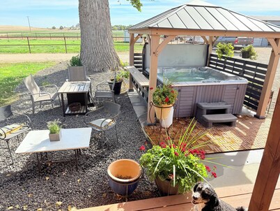 Farm style home in the heart of wine country, with acreage and a hot tub!