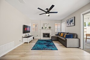 Smart TV, fireplace, foosball, books