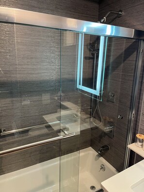 Suite, City View | Bathroom | Combined shower/tub, free toiletries, hair dryer, slippers