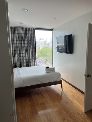 Suite, City View | In-room safe, desk, laptop workspace, blackout drapes