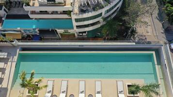 Outdoor pool, free cabanas, pool umbrellas