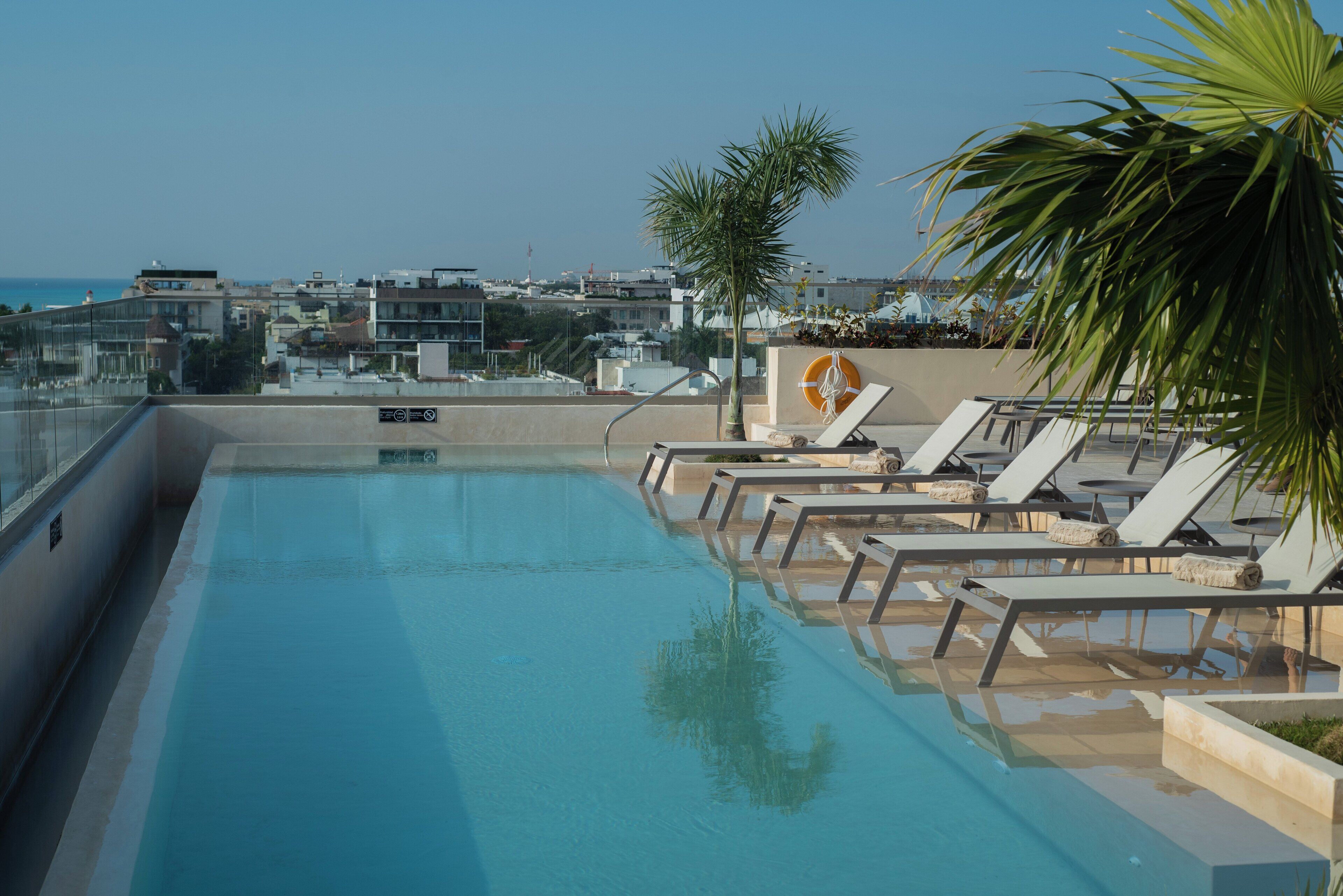Outdoor pool, free cabanas, pool umbrellas