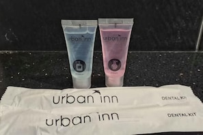 Two Urban Inn dental kits on a countertop. - Urban Inn Myra Meranti (Puchong)