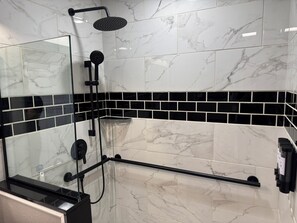 Shower, hair dryer, towels, soap