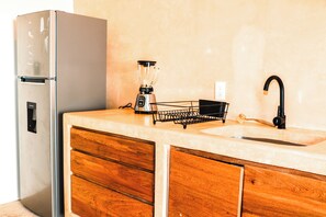 Coffee/tea maker, blender, cleaning supplies