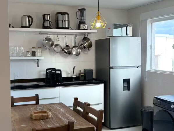 Fridge, microwave, stovetop, lobster pot