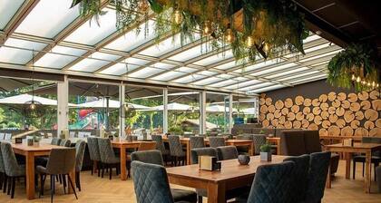 Luxe chalet met ruime veranda & airco, vlak bij Toverland