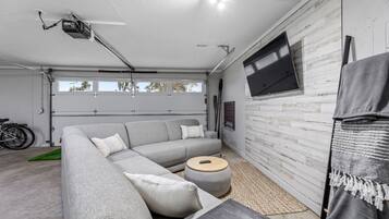 Smart TV, fireplace, foosball, books