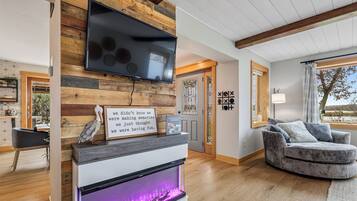 Smart TV, fireplace, foosball, books