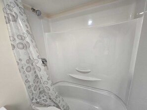 Hair dryer, bidet, towels, soap - Stormwater Haven: Peaceful, Stylish and comfortable space in South Winnipeg. (Winnipeg)