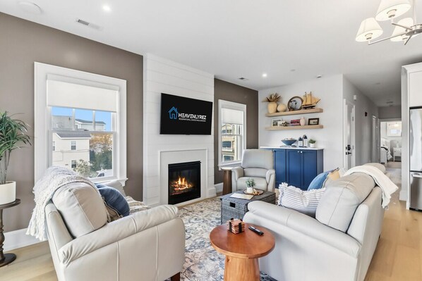 Smart TV, fireplace, books