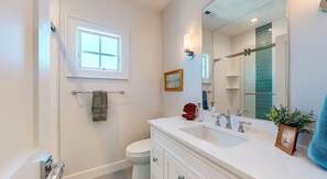 Shower, hair dryer, towels, soap
