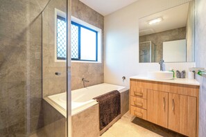 Shower, hair dryer, towels, soap