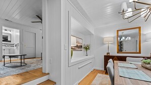 A modern kitchen with white cabinetry, a built-in oven, and a countertop with a sink. - Dahlia House: 3 BDRM home in Highlands, NC, just a short walk to town. (Highlands)