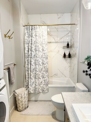Hair dryer, towels, soap, toilet paper