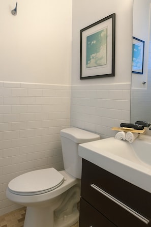 Shower, hair dryer, towels, soap