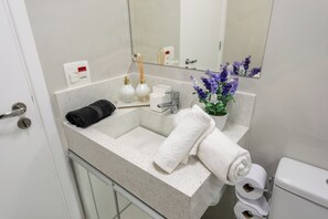 Hair dryer, bidet, towels, soap
