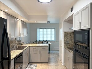 Private kitchen - Freshly Remodeled Long Term 2BR Condo with Pool Access in Gated Community (San Antonio)