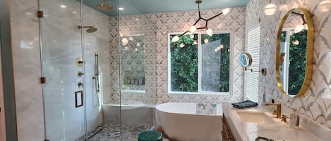 Shower, towels, soap, toilet paper