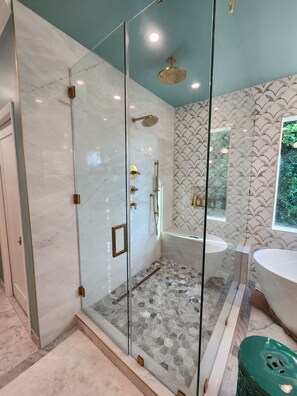 Shower, towels, soap, toilet paper