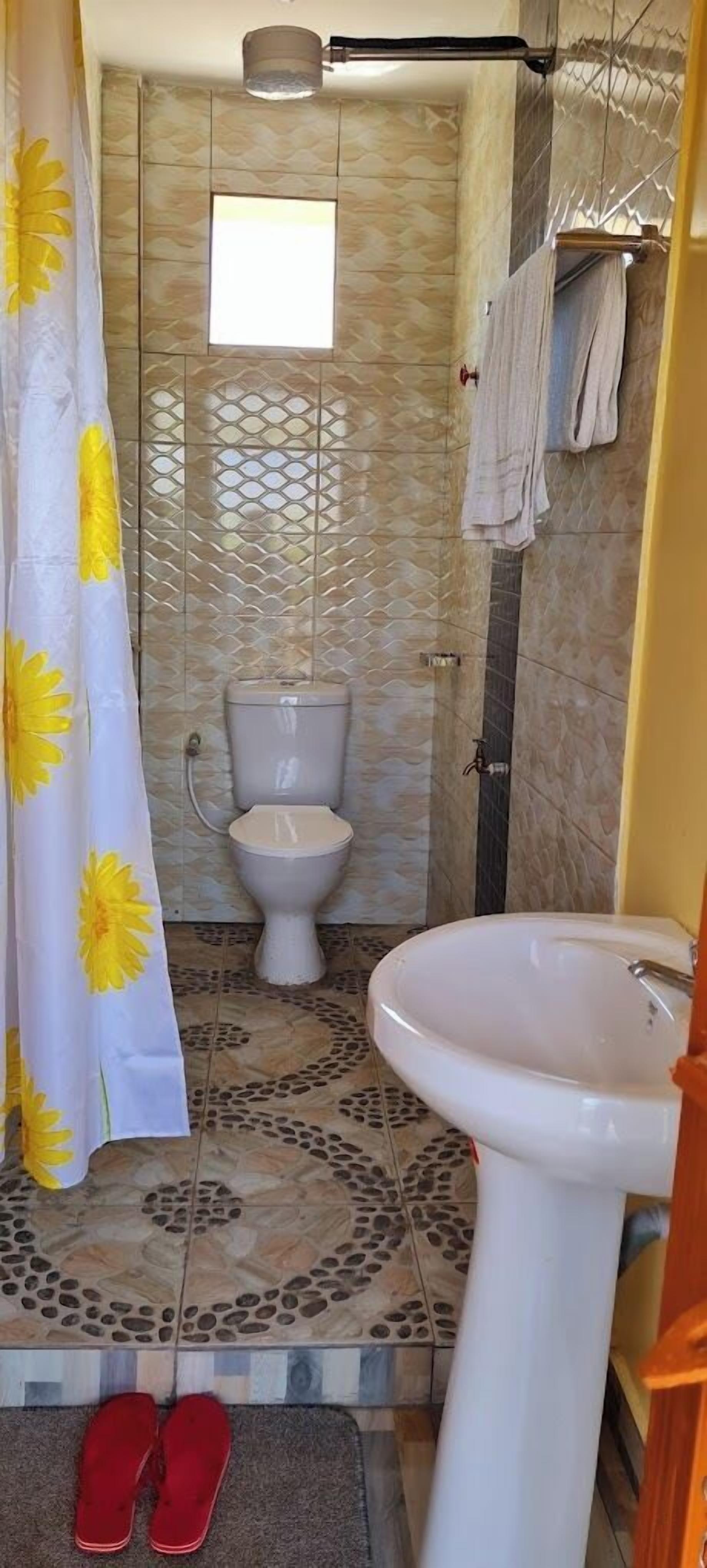 Deluxe Single Room, Garden View | Bathroom | Shower, slippers, towels, soap