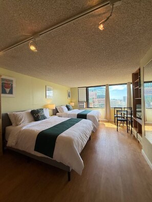 2 dormitorios, escritorio, tabla de planchar con plancha y wifi