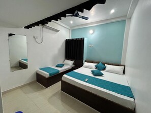 Family Room | Blackout curtains, iron/ironing board - Shree Gomukh Residency (Varanasi)