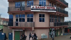 A multi-story building with a sign for "SAIMO HOTEL" on the ground floor. - Saimo Hotel Kabarnet (Kabarnet)