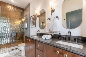 Shower, hair dryer, towels, shampoo