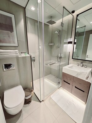 Shower, bidet, towels, soap