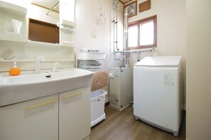 A compact kitchen with a sink, a refrigerator, and a washing machine. - YADOKITO2 / Otaru Hokkaidō (Otaru)