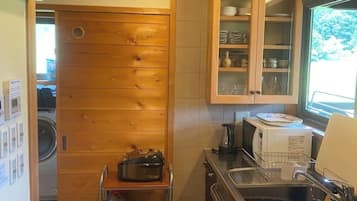 Fridge, microwave, stovetop, cookware/dishes/utensils