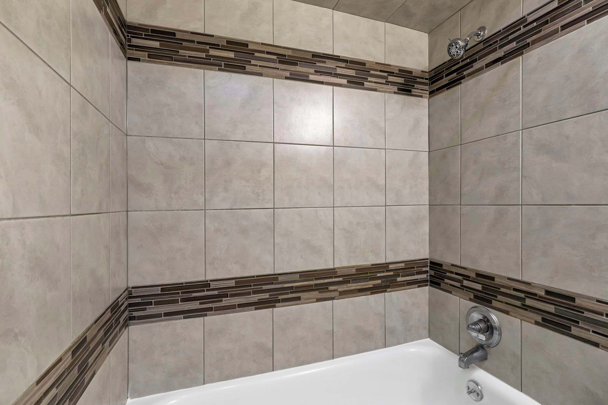 Shower, hair dryer, towels, shampoo